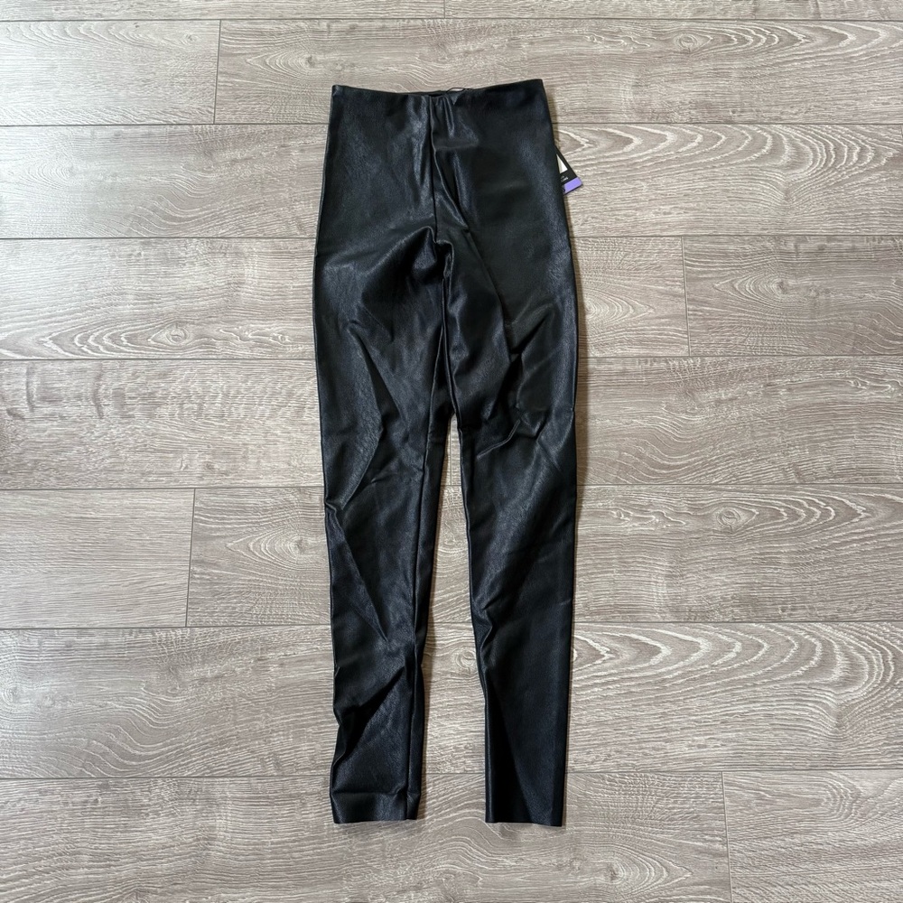 NEW with tag. Black Faux Leather Leggings. Size XS